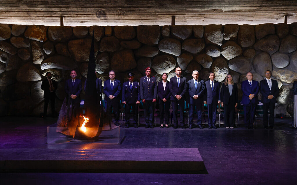 President Isaac Herzog, Prime Minister Benjamin Netanyahu, Knesset Speaker, Supreme Court President Esther Hayut and others at a ceremony in the Hall of Remembrance at the Yad Vashem holocaust museum in Jerusalem, on Holocaust Remembrance Day on April 18, 2023. (Erik Marmor/Flash90)