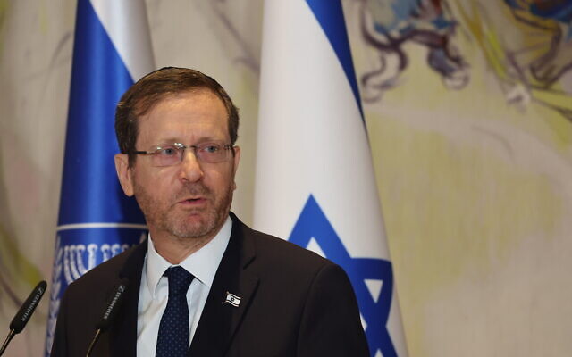 President Isaac Herzog attends a Holocaust memorial day ceremony held at the Knesset in Jerusalem, April 18, 2023. (Yonatan Sindel/Flash90)