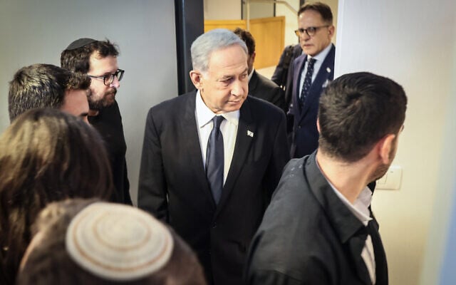 Illustrative: Prime Minister Benjamin Netanyahu attends a court hearing for a case against journalist Ben Caspit at the Tel Aviv Magistrate's Court, on April 23. 2023.  (Tomer Appelbaum/POOL)