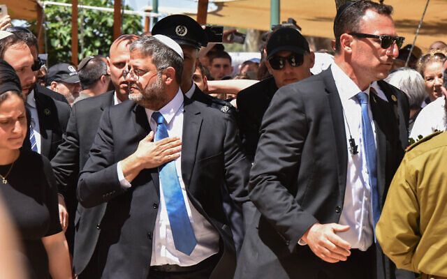 Minister of National Security Itamar Ben Gvir attends a ceremony marking Memorial Day which commemorates the fallen Israeli soldiers and victims of terror, at the military cemetery in Beersheba, April 25, 2023. (Dudu Greenspan/Flash90) Minister of National Security Itamar Ben Gvir attends a ceremony marking Memorial Day which commemorates the fallen Israeli soldiers and victims of terror, at the military cemetery in Beersheba, April 25, 2023. (Dudu Greenspan/Flash90)