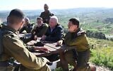 Defense Minister Yoav Gallant (second from right), during a briefing in the West Bank on April 2, 2023. (Ariel Hermoni/ Defense Ministry)