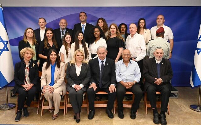 Prime Minister Benjamin Netanyahu (bottom center) and Transportation Minister Miri Regev (bottom, 2nd left) with the Independence Day ceremony torch lighters on April 19, 2023. (Haim Zach/GPO) Prime Minister Benjamin Netanyahu (bottom center) and Transportation Minister Miri Regev (bottom, 2nd left) with the Independence Day ceremony torch lighters on April 19, 2023. (Haim Zach/GPO)