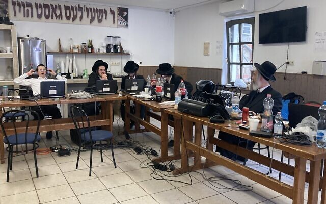 Inside the Friedlander compound's 'command center' at the annual pilgrimage to the gravesite of 'Wonder Rabbi' Yeshaya Steiner in Bodrogkeresztur, Hungary, April 24, 2023. (Yaakov Schwartz/ Times of Israel)