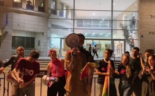 LGBTQ activists protest outside a Tel Aviv police station on April 19, 2023. (Screen capture/YouTube) LGBTQ activists protest outside a Tel Aviv police station on April 19, 2023. (Screen capture/YouTube)