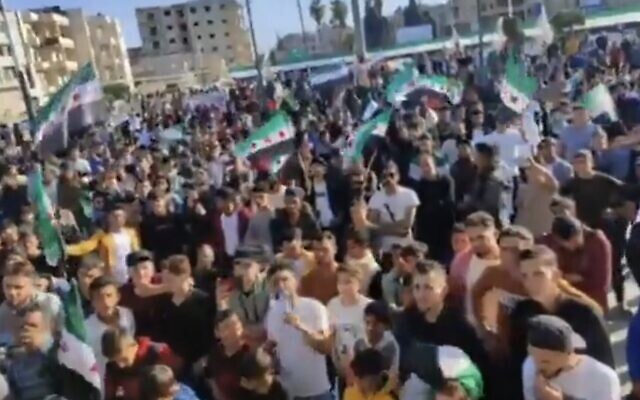 Screencapture from unverified video showing a protest against normalization by Arab nations with the Syrian regime, in the rebel-hold city of Idlib, Syria, April 23, 2023. (Twitter. Used in accordance with Clause 27a of the Copyright Law) Screencapture from unverified video showing a protest against normalization by Arab nations with the Syrian regime, in the rebel-hold city of Idlib, Syria, April 23, 2023. (Twitter. Used in accordance with Clause 27a of the Copyright Law)