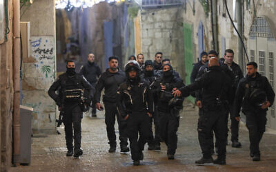 Israeli police patrol in Jerusalem's Old City after a shooting incident early on April 1, 2023. (Ahmad Gharabli/AFP)
