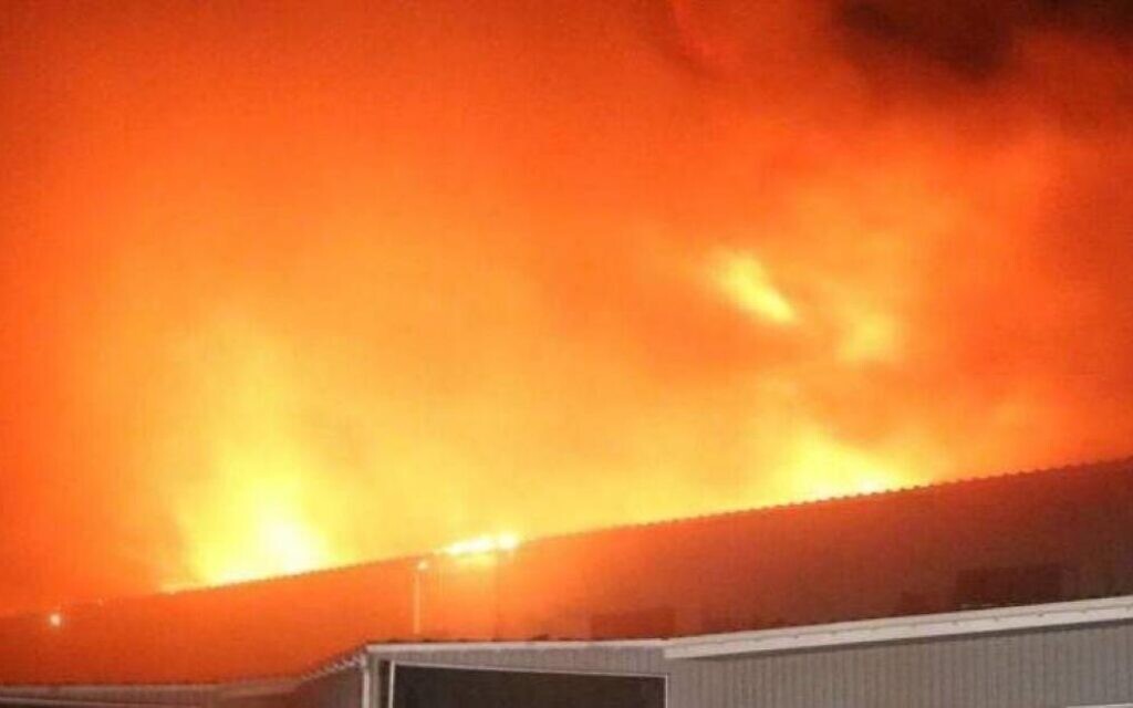 A factory in southern Dnipro, next to Ukraine's main matzah bakery, goes up in flames after a Russian drone attack, March 29, 2023 (Federation of Jewish Communities of Ukraine)