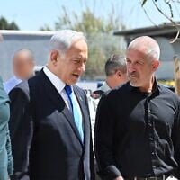 Prime Minister Benjamin Netanyahu (left) and Shin Bet chief Ronen Bar, at a pre-Passover toast on April 4, 2023. (Kobi Gideon/GPO)
