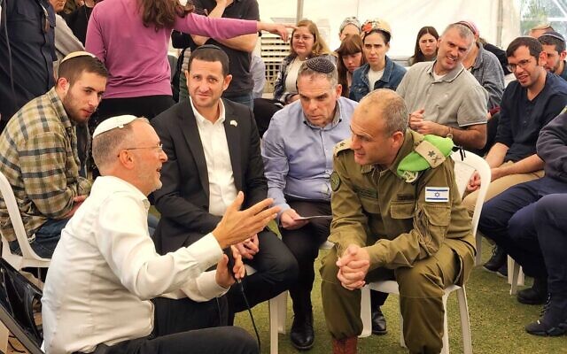 Rabbi Leo Dee (left) talks with OC Central Command Yehuda Fox at his home in the West Bank settlement of Efrat, April 14, 2023. (Efrat Municipality spokesperson) Rabbi Leo Dee (left) talks with OC Central Command Yehuda Fox at his home in the West Bank settlement of Efrat, April 14, 2023. (Efrat Municipality spokesperson)