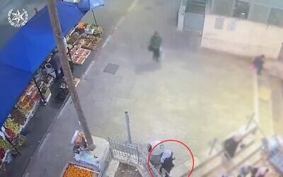 Security camera footage of a woman arrested in the Old City of Jerusalem on April 2 on suspicion of planning a stabbing attack. (Israel Police) Security camera footage of a woman arrested in the Old City of Jerusalem on April 2 on suspicion of planning a stabbing attack. (Israel Police)