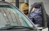 Wall Street Journal reporter Evan Gershkovich is escorted by officers from the Lefortovsky court to a bus, in Moscow, Russia, March 30, 2023. (AP Photo/Alexander Zemlianichenko, File)