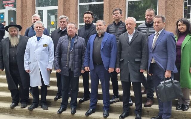 Rabbi Moshe Azman, left,with officials at the dedication of a new rehabilitation wing of a hospital in the city of Chernivtsi in western Ukraine, April 28, 2023. (Office of Rabbi Moshe Azman) Rabbi Moshe Azman, left,with officials at the dedication of a new rehabilitation wing of a hospital in the city of Chernivtsi in western Ukraine, April 28, 2023. (Office of Rabbi Moshe Azman)