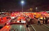 Magen David Adom ambulances and medics on stanby as an El Al plane traveling from Tel Aviv to Tokyo had to double back and make an emergency landing at Ben Gurion Airport, April 22, 2023. (MDA)