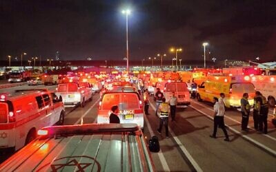 Magen David Adom ambulances and medics on stanby as an El Al plane traveling from Tel Aviv to Tokyo had to double back and make an emergency landing at Ben Gurion Airport, April 22, 2023. (MDA)