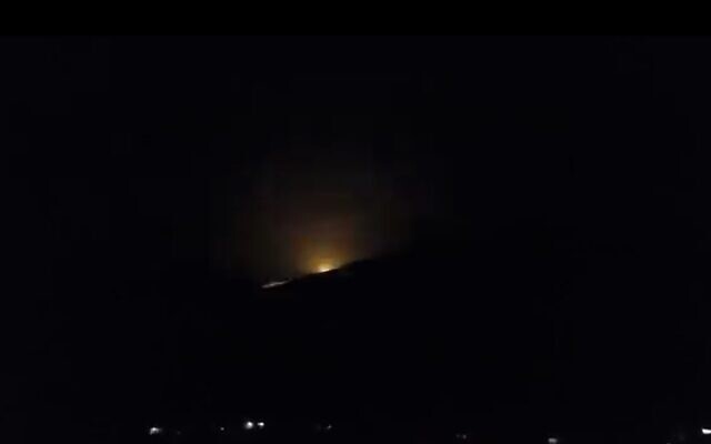 Flashes in the night sky and explosions near the Syrian town of Hader in the Quneitra Governorate, April 24, 2023. (Twitter/screenshot, used in accordance with Clause 27a of the Copyright Law) Flashes in the night sky and explosions near the Syrian town of Hader in the Quneitra Governorate, April 24, 2023. (Twitter/screenshot, used in accordance with Clause 27a of the Copyright Law)