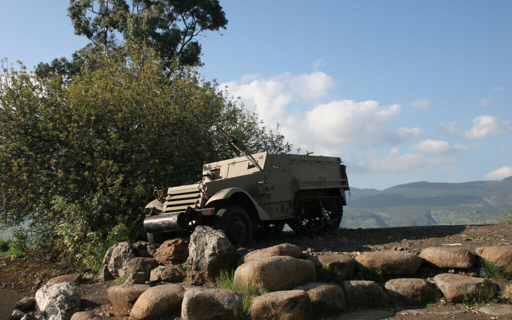 A half-track armored personnel carrier stands as a memorial at Tel Faher. (Shmuel Bar-Am)