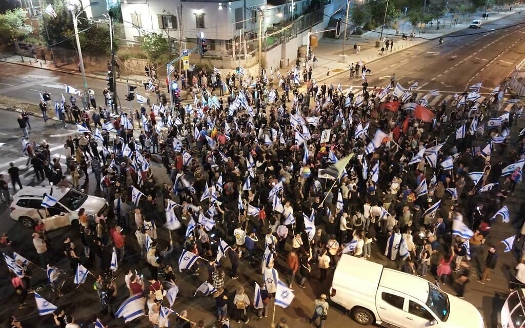 Hundreds of protesters rally on Kaplan street in Tel Aviv for anti-government protests after PM Benjamin Netanyahu blamed the opposition for a wave of terror attacks in recent days that killed four people, April 10, 2023. (Yair Palti)
