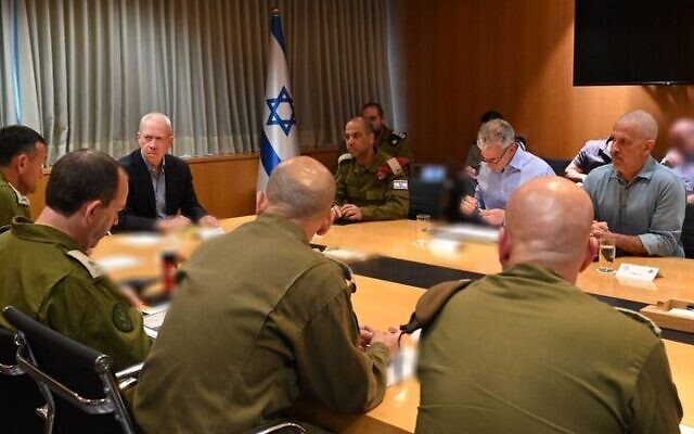 Defense Minister Yoav Gallant meets with senior military and defense officials at the IDF's headquarters in Tel Aviv, April 6, 2023. (Ariel Hermoni/Defense Ministry) Defense Minister Yoav Gallant meets with senior military and defense officials at the IDF's headquarters in Tel Aviv, April 6, 2023. (Ariel Hermoni/Defense Ministry)