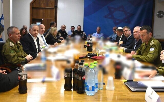 Prime Minister Benjamin Netanyahu, Defense Minister Yoav Gallant, Foreign Minister Eli Cohen and senior defense and military officials hold a meeting ahead of a security cabinet meeting to discuss a response to rocket fire from Lebanon, April 6, 2023. (Ariel Hermoni/Defense Ministry)