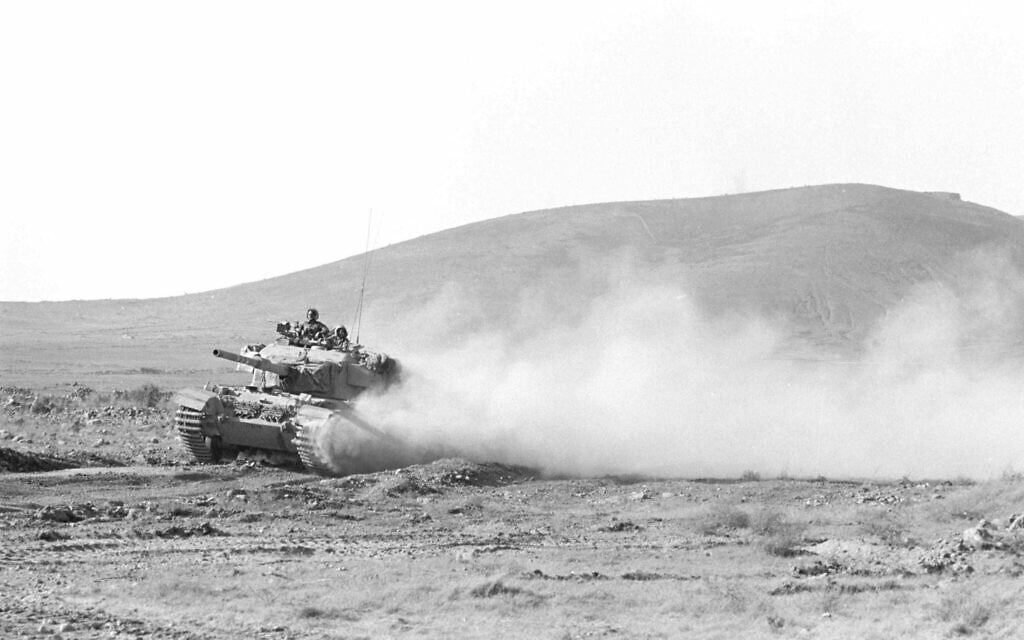 A IDF Sho't Kal (Centurion) tank is seen driving in the northern Golan Heights on October 11, 1973, during a counterattack by the 7th Brigade or 179th Brigade during the Yom Kippur War. (Avraham Vered/Defense Ministry Archives) A IDF Sho't Kal (Centurion) tank is seen driving in the northern Golan Heights on October 11, 1973, during a counterattack by the 7th Brigade or 179th Brigade during the Yom Kippur War. (Avraham Vered/Defense Ministry Archives)