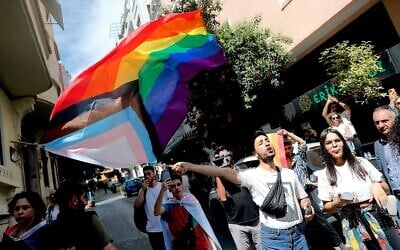 A participant waves a rainbow flag during a Pride march in Istanbul, on June 26, 2022 (KEMAL ASLAN / AFP)