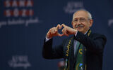 Turkey's Republican People's Party (CHP) chair and presidential candidate Kemal Kilicdaroglu gestures on stage during a rally in Kocaeli, Turkey, on April 28, 2023. (Yasin AKGUL/AFP)