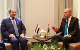 Jordanian Foreign minister Ayman Safadi (R) meets his Syrian counterpart Faisal Mekdad in Amman on May 1, 2023, ahead of a regional meeting on Syria (Khalil MAZRAAWI / AFP)