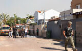 Israeli security forces and emergency personnel cordon off an area in the southern city of Sderot on May 2, 2023, following a rocket attack from the Gaza Strip. (GIL COHEN-MAGEN / AFP)
