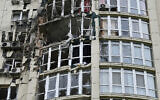 This photograph taken on May 8, 2023, shows a high-rise residential building damaged by remains of a shot down Russian drone in Kyiv, amid the Russian invasion of Ukraine (Genya SAVILOV / AFP)