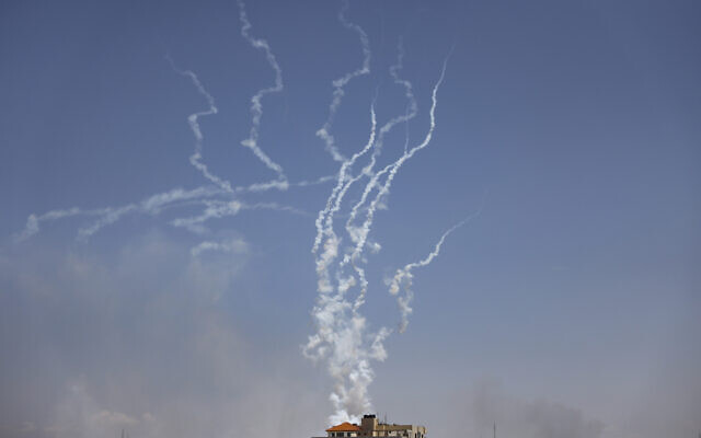 Rockets are fired from Gaza City toward Israel on May 13, 2023. (Mohammed Abed/AFP)
