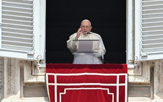 Illustrative: Pope Francis blesses attendees from the window of the apostolic palace overlooking St. Peter's square during the Regina Coeli prayer on May 14, 2023 in The Vatican. (Tiziana FABI / AFP) Illustrative: Pope Francis blesses attendees from the window of the apostolic palace overlooking St. Peter's square during the Regina Coeli prayer on May 14, 2023 in The Vatican. (Tiziana FABI / AFP)