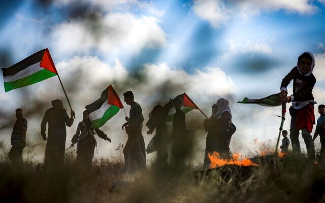Protesters gather during a Palestinian demonstration in Gaza along the border with Israel, May 18, 2023, in protest of the Jerusalem Day Flag March. (MOHAMMED ABED / AFP) Protesters gather during a Palestinian demonstration in Gaza along the border with Israel, May 18, 2023, in protest of the Jerusalem Day Flag March. (MOHAMMED ABED / AFP)