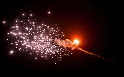 A drone exploding after it is shot down during a massive Russian drone strike mainly targeting Kyiv, Ukraine, on May 28, 2023. (Sergei SUPINSKY / AFP)