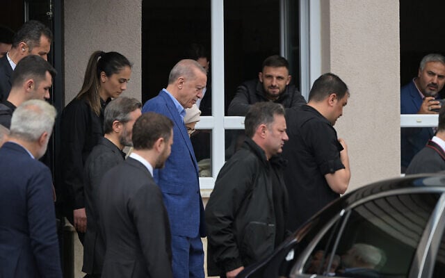 Turkish President Recep Tayyip Erdogan (C) leaves the polling station on the day of the runoff vote, in Istanbul, May 28, 2023. (Ozan Kose/AFP) Turkish President Recep Tayyip Erdogan (C) leaves the polling station on the day of the runoff vote, in Istanbul, May 28, 2023. (Ozan Kose/AFP)