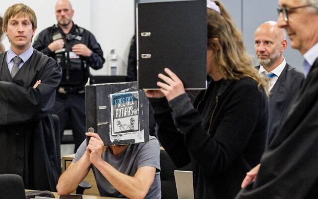 The defendant Lina E. (C-R) and a other defendant (C-L) are seen in the courtroom at the higher regional court in Dresden, eastern Germany, on May 31, 2023. (JENS SCHLUETER / AFP) The defendant Lina E. (C-R) and a other defendant (C-L) are seen in the courtroom at the higher regional court in Dresden, eastern Germany, on May 31, 2023. (JENS SCHLUETER / AFP)