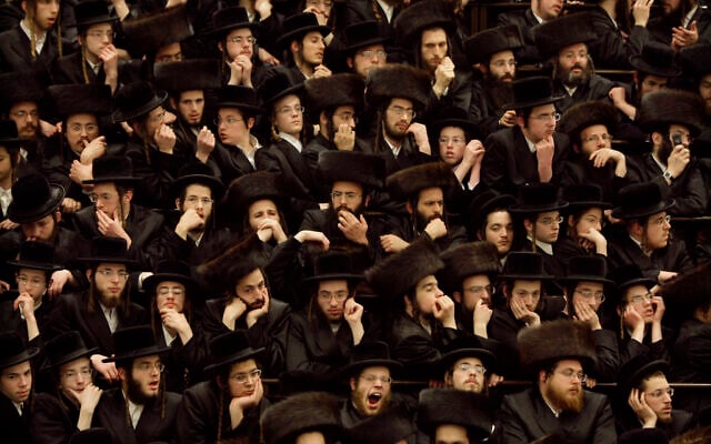 In this file photo taken on March 11, 2009, Haredi men gather at a yeshiva in Jerusalem. (AP Photo/Kevin Frayer) In this file photo taken on March 11, 2009, Haredi men gather at a yeshiva in Jerusalem. (AP Photo/Kevin Frayer)