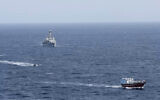 Ilustrative -- In this photo released by Combined Maritime Forces, a boarding team from a British royal navy vessel, the HMS Montrose, transits towards a stateless dhow, a traditional cargo ship that plies the Persian Gulf and surrounding waters, in the northern Arabian Sea, Oct. 14, 2020 (Combined Maritime Forces via AP)