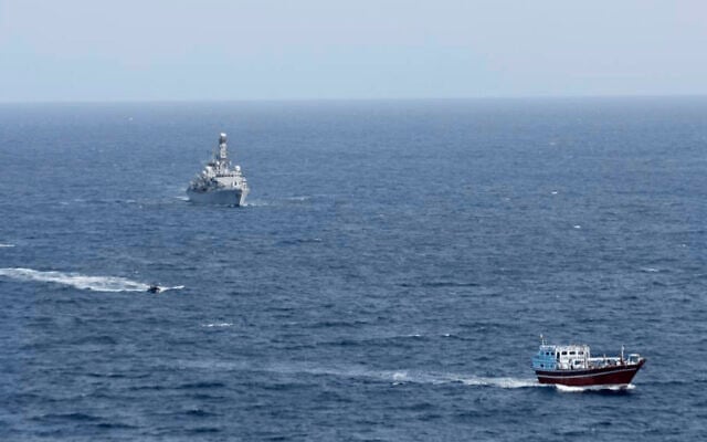 Ilustrative -- In this photo released by Combined Maritime Forces, a boarding team from a British royal navy vessel, the HMS Montrose, transits towards a stateless dhow, a traditional cargo ship that plies the Persian Gulf and surrounding waters, in the northern Arabian Sea, Oct. 14, 2020 (Combined Maritime Forces via AP) Ilustrative -- In this photo released by Combined Maritime Forces, a boarding team from a British royal navy vessel, the HMS Montrose, transits towards a stateless dhow, a traditional cargo ship that plies the Persian Gulf and surrounding waters, in the northern Arabian Sea, Oct. 14, 2020 (Combined Maritime Forces via AP)
