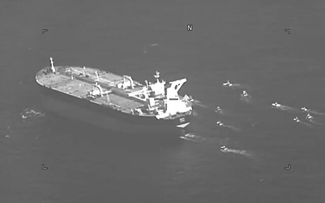 This still image from video released by the U.S. Navy shows the Panama-flagged oil tanker Niovi surrounded by Iranian Revolutionary Guard vessels in the Strait of Hormuz Wednesday, May 3, 2023. (U.S. Navy via AP) This still image from video released by the U.S. Navy shows the Panama-flagged oil tanker Niovi surrounded by Iranian Revolutionary Guard vessels in the Strait of Hormuz Wednesday, May 3, 2023. (U.S. Navy via AP)