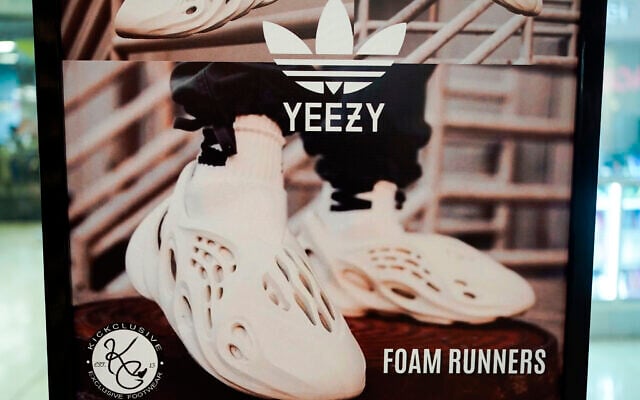 A sign advertises Yeezy shoes made by Adidas at Kickclusive, a sneaker resale store, in Paramus, NJ, Tuesday, October 25, 2022. (AP Photo/Seth Wenig, File) A sign advertises Yeezy shoes made by Adidas at Kickclusive, a sneaker resale store, in Paramus, NJ, Tuesday, October 25, 2022. (AP Photo/Seth Wenig, File)