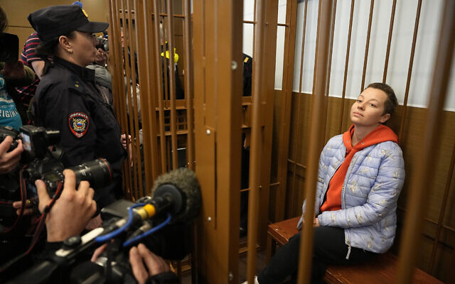 Theater director Zhenya Berkovich sits in a cage in a courtroom prior to a hearing in a court in Moscow, Russia, Friday, May 5, 2023. (AP Photo/Alexander Zemlianichenko) Theater director Zhenya Berkovich sits in a cage in a courtroom prior to a hearing in a court in Moscow, Russia, Friday, May 5, 2023. (AP Photo/Alexander Zemlianichenko)