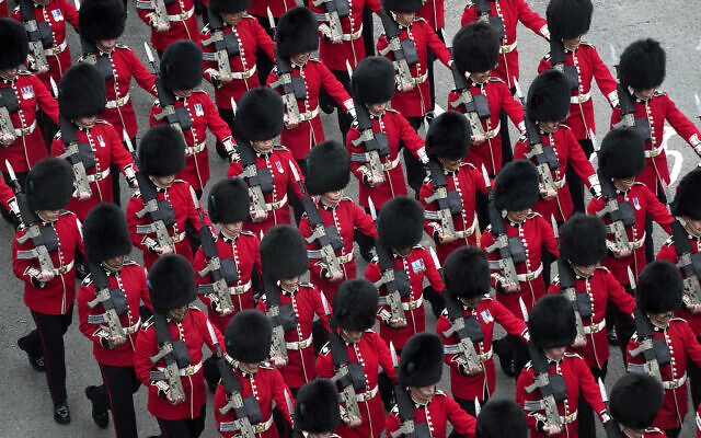 Coldstream Guards marching ahead of the Coronation of Britain's King Charles III in London, Saturday, May 6, 2023. (Carl Court/Pool Photo via AP)