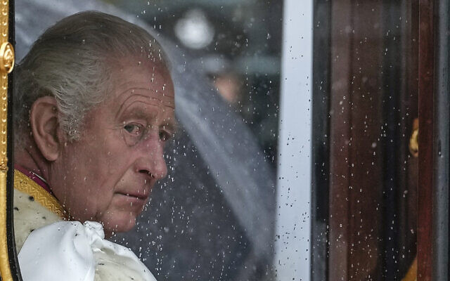Britain's King Charles III makes his way to Westminster Abbey prior to his coronation ceremony in London Saturday, May 6, 2023. (AP Photo/Alessandra Tarantino)