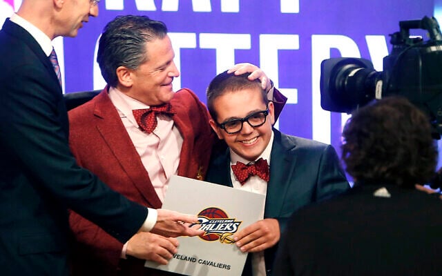 Cleveland Cavaliers owner Dan Gilbert and his son, Nick Gilbert, at an NBA basketball draft lottery in New York, May 21, 2013. (AP Photo/Jason DeCrow, File) Cleveland Cavaliers owner Dan Gilbert and his son, Nick Gilbert, at an NBA basketball draft lottery in New York, May 21, 2013. (AP Photo/Jason DeCrow, File)