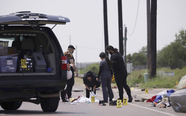 Emergency personnel respond to a fatal collision in Brownsville, Texas, on Sunday, May 7, 2023. Several migrants were killed after they were struck by a vehicle while waiting at a bus stop near Ozanam Center, a migrant and homeless shelter. (AP Photo/Michael Gonzalez) Emergency personnel respond to a fatal collision in Brownsville, Texas, on Sunday, May 7, 2023. Several migrants were killed after they were struck by a vehicle while waiting at a bus stop near Ozanam Center, a migrant and homeless shelter. (AP Photo/Michael Gonzalez)