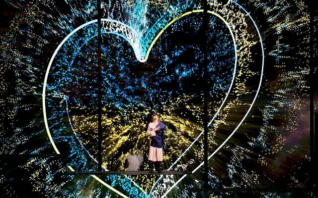 Alyosha from Ukraine performs as a show act during the first semifinal at the Eurovision Song Contest in Liverpool, England, May 9, 2023. (AP Photo/Martin Meissner)