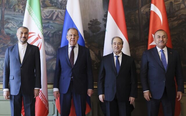 Iran's Foreign Minister Hossein Amirabollahian, left, Russia's Foreign Minister Sergey Lavrov, second left, Syria's Foreign Minister Faisal Mekdad, second right, and Turkey's Foreign Minister Mevlut Cavusoglu pose for a photo prior to their talks in Moscow, May 10, 2023. (Russian Foreign Ministry Press Service via AP) Iran's Foreign Minister Hossein Amirabollahian, left, Russia's Foreign Minister Sergey Lavrov, second left, Syria's Foreign Minister Faisal Mekdad, second right, and Turkey's Foreign Minister Mevlut Cavusoglu pose for a photo prior to their talks in Moscow, May 10, 2023. (Russian Foreign Ministry Press Service via AP)