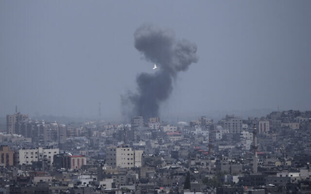 Smoke rises from an explosion caused by an Israeli airstrike in the Gaza Strip after rocket fire, May 13, 2023. (AP Photo/Hatem Moussa) Smoke rises from an explosion caused by an Israeli airstrike in the Gaza Strip after rocket fire, May 13, 2023. (AP Photo/Hatem Moussa)