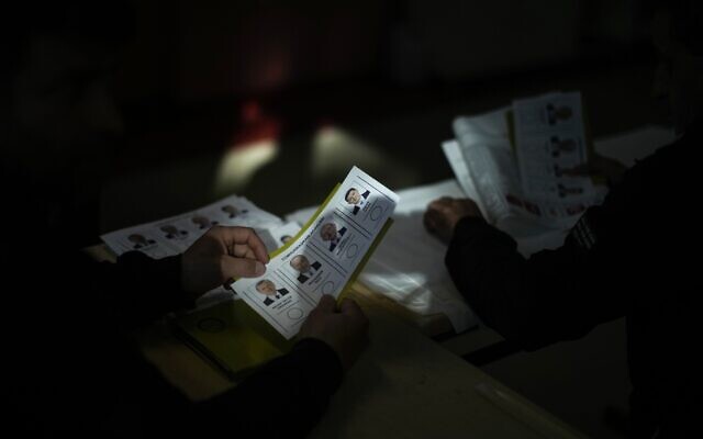 Election representative prepare the ballots at a polling station at a polling station in Istanbul, Turkey, May 14, 2023 (AP Photo/Francisco Seco)