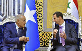 Syrian President Bashar Assad, talks to Ahmed Aboul Gheit, secretary-general of the Arab League, upon his arrival at Jeddah airport, Saudi Arabia, May 18, 2023, ahead of the Arab summit. (Saudi Press Agency via AP)